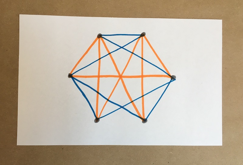 Six dots connected with two colors of lines