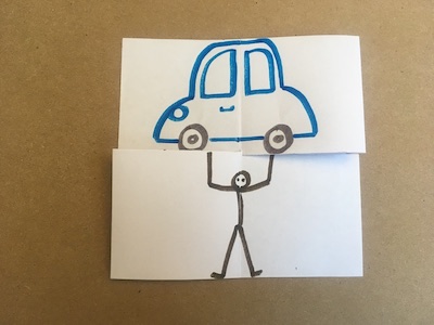 Flexagon with person holding up a car