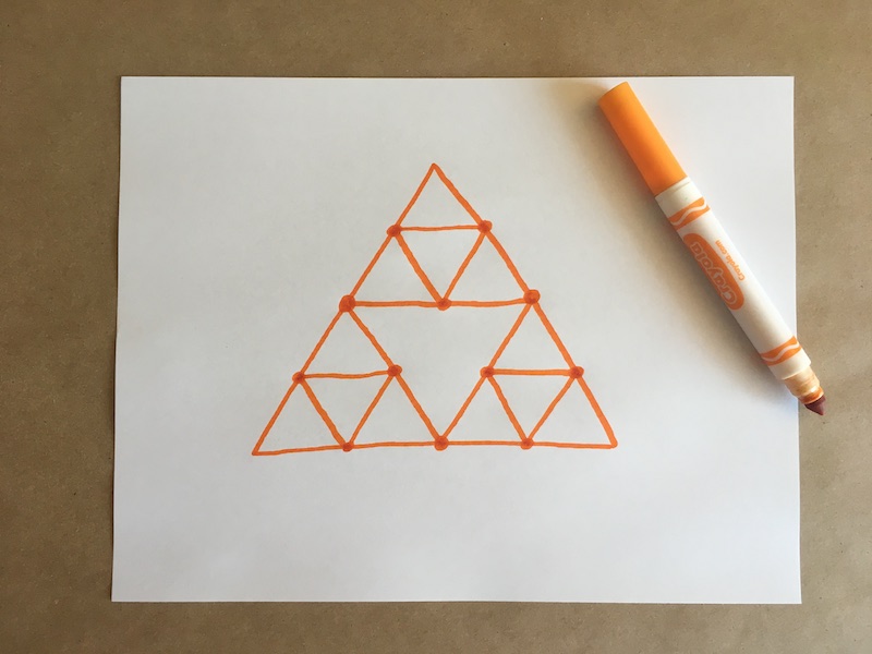 Triangles drawn on a piece of paper