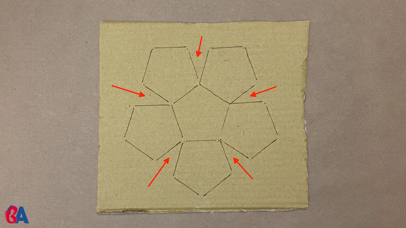 Pentagons on cardboard