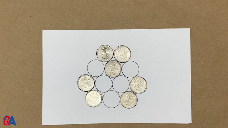 Coins arranged on a paper