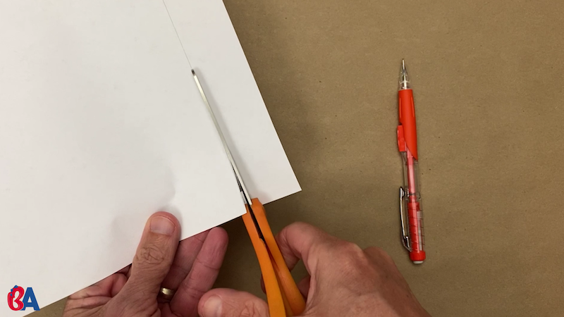 Cutting across the line to make a strip of paper