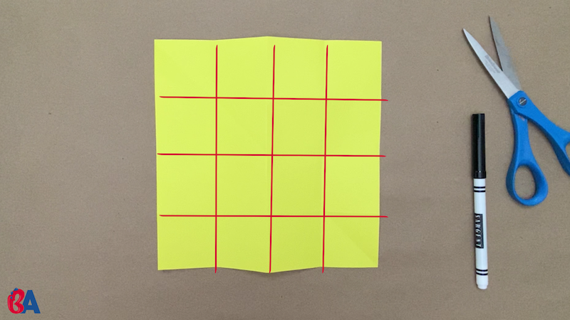 Square of paper divided into sixteen smaller squares